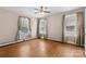 Comfortable bedroom with hardwood floors and plenty of natural light at 4608 Beatties Ford Rd, Charlotte, NC 28216
