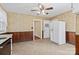 Well-lit kitchen featuring ample counter space and classic white cabinetry at 4608 Beatties Ford Rd, Charlotte, NC 28216