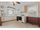 Functional kitchen with white cabinets and plenty of natural light at 4608 Beatties Ford Rd, Charlotte, NC 28216