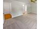 Large main bedroom with carpet floor, white walls, and ensuite bathroom at 5013 Prestwick Ln, Charlotte, NC 28212