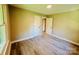 Bedroom with neutral paint, closet storage, and lots of natural light at 509 North St, Belmont, NC 28012