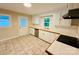 Classic kitchen with ample counter space, stainless steel sink, and bright natural light at 509 North St, Belmont, NC 28012