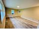 Bright living room with wood-look flooring and natural light at 509 North St, Belmont, NC 28012