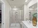 Modern bathroom featuring a glass-enclosed shower, neutral tiling, and modern hardware at 518 Tayberry Ln, Fort Mill, SC 29715