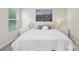 Comfortable bedroom with natural light, a queen bed, neutral colors, and modern decor at 518 Tayberry Ln, Fort Mill, SC 29715
