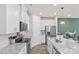 Bright kitchen with stainless steel appliances, white cabinetry and spacious countertops at 518 Tayberry Ln, Fort Mill, SC 29715