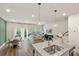 Open-concept living space featuring a modern kitchen, dining area, and inviting living room at 518 Tayberry Ln, Fort Mill, SC 29715