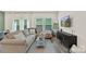 Bright living room featuring a comfortable sectional sofa and stylish coffee table decor at 518 Tayberry Ln, Fort Mill, SC 29715