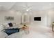 Cozy living room features plush seating, modern decor, and bright, neutral tones at 601 Carver Pond Ln, Waxhaw, NC 28173