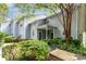Charming townhome with covered front porch and lush landscaping at 6011 Treetop Ct, Charlotte, NC 28212