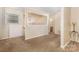 Bright living room with large window and view to upper level at 6011 Treetop Ct, Charlotte, NC 28212