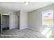Bedroom with carpeted floors, two closets, and a window at 6027 Veld Ct # 82, Charlotte, NC 28215
