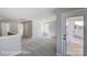This inviting bedroom is filled with natural light and offers access to a charming outdoor balcony at 6027 Veld Ct # 82, Charlotte, NC 28215