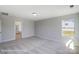 Spacious bedroom offering a serene atmosphere with neutral tones and plush carpeting at 6027 Veld Ct # 82, Charlotte, NC 28215