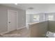 Upstairs hallway with carpet, natural light, and neutral walls at 6027 Veld Ct # 82, Charlotte, NC 28215