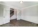 Bright home office with glass french doors and hardwood floors at 6027 Veld Ct # 82, Charlotte, NC 28215