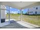 Screened in patio with an outdoor view of the yard and neighborhood at 6027 Veld Ct # 82, Charlotte, NC 28215