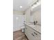 Bathroom with granite countertops, shower-tub combo, modern fixtures, and tile floor at 630 W Bell St, Statesville, NC 28677