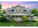 Charming two-story home featuring a welcoming front porch and manicured landscaping at 6362 Sherrills Ford Rd, Catawba, NC 28609