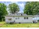 The back of the house with white siding and a small porch at 6362 Sherrills Ford Rd, Catawba, NC 28609