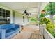 Relax on the large covered porch, complete with comfortable seating and a ceiling fan at 6362 Sherrills Ford Rd, Catawba, NC 28609