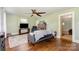 Inviting living room features hardwood floors, fireplace, fan, and a comfortable seating area at 6362 Sherrills Ford Rd, Catawba, NC 28609
