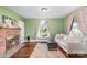 Bright living room with hardwood floors, a fireplace and large window at 6362 Sherrills Ford Rd, Catawba, NC 28609