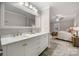 Bright, spa-like bathroom with double vanity and view into the bedroom, creating a seamless and luxurious space at 7 Turtle Ln, Clover, SC 29710