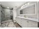 Modern bathroom with double vanity, elegant countertops, and glass-enclosed shower, creating a spa-like retreat at 7 Turtle Ln, Clover, SC 29710