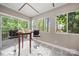 Bright breakfast nook with large windows and access to the back deck, creating a perfect setting for morning coffee at 7 Turtle Ln, Clover, SC 29710