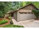 Charming home exterior featuring a stone facade, two-car garage, and well-maintained landscaping at 7 Turtle Ln, Clover, SC 29710