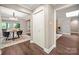Hallway showcasing view to dining area and living room with neutral tones and hardwood flooring at 7 Turtle Ln, Clover, SC 29710