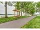 Picturesque lakefront park featuring a charming wooden swing and walking path at 7 Turtle Ln, Clover, SC 29710