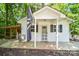 Cozy exterior with welcoming front porch, perfect for relaxing and enjoying the outdoors at 7328 S Providence Rd, Waxhaw, NC 28173