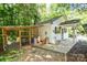 Exterior featuring a chicken coop and covered porch area, perfect for outdoor activities at 7328 S Providence Rd, Waxhaw, NC 28173