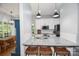 Modern kitchen with granite countertops and stainless steel appliances at 7328 S Providence Rd, Waxhaw, NC 28173