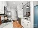 Contemporary kitchen with granite countertops and stainless steel appliances at 7328 S Providence Rd, Waxhaw, NC 28173