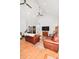 Vaulted ceiling and hardwood floors highlight this cozy living room at 7328 S Providence Rd, Waxhaw, NC 28173