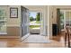 Charming foyer with hardwood floors, an entry closet and lots of natural light at 7627 Woodcrest Dr, Stanley, NC 28164