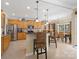 Well-equipped kitchen features stainless steel appliances, ample counter space, and bar stool seating at 7627 Woodcrest Dr, Stanley, NC 28164