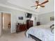 View of main bedroom showcasing crown molding, neutral paint, and a connecting door with a glimpse of the living space at 7627 Woodcrest Dr, Stanley, NC 28164
