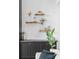 Close-up of built-in shelves and drawers in the living room, showcasing decorative items and plants at 120 Lakeshore Dr, Mooresville, NC 28117