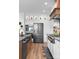 Gourmet kitchen with stainless steel appliances, designer cabinets, and a modern island at 120 Lakeshore Dr, Mooresville, NC 28117