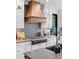 Modern kitchen features stone counters, stainless steel appliances, and white cabinetry at 120 Lakeshore Dr, Mooresville, NC 28117