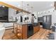 A modern kitchen with a large island, stainless steel appliances, and custom cabinetry at 120 Lakeshore Dr, Mooresville, NC 28117