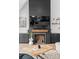 Cozy living room featuring a modern fireplace and custom built-in shelving at 120 Lakeshore Dr, Mooresville, NC 28117