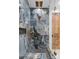 Luxurious shower with marble-style tile, bronze fixtures, and dual shower heads at 120 Lakeshore Dr, Mooresville, NC 28117