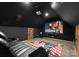 The home theater features comfortable seating, a large screen, and theater decor at 120 Lakeshore Dr, Mooresville, NC 28117