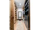 Spacious walk-in closet with custom shelving and drawers for optimal organization at 120 Lakeshore Dr, Mooresville, NC 28117
