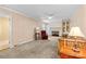 Bright living room features a fireplace, built-in shelving, and carpeted floor at 124 Courtney Ln, Matthews, NC 28105